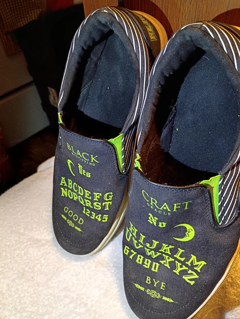 Craft Black Slip-On Sneakers with Neon Green Lettering